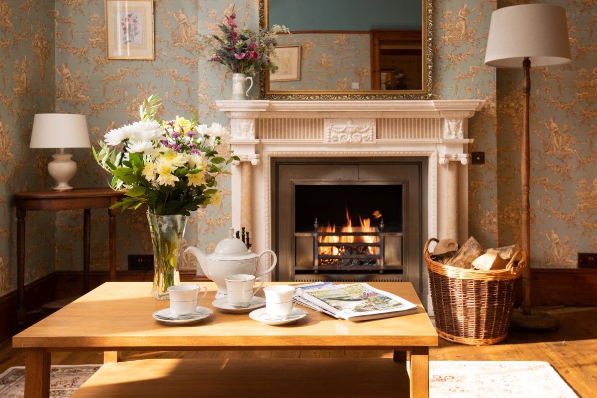 Sitting room with open fireplace, logs supplied in the winter months